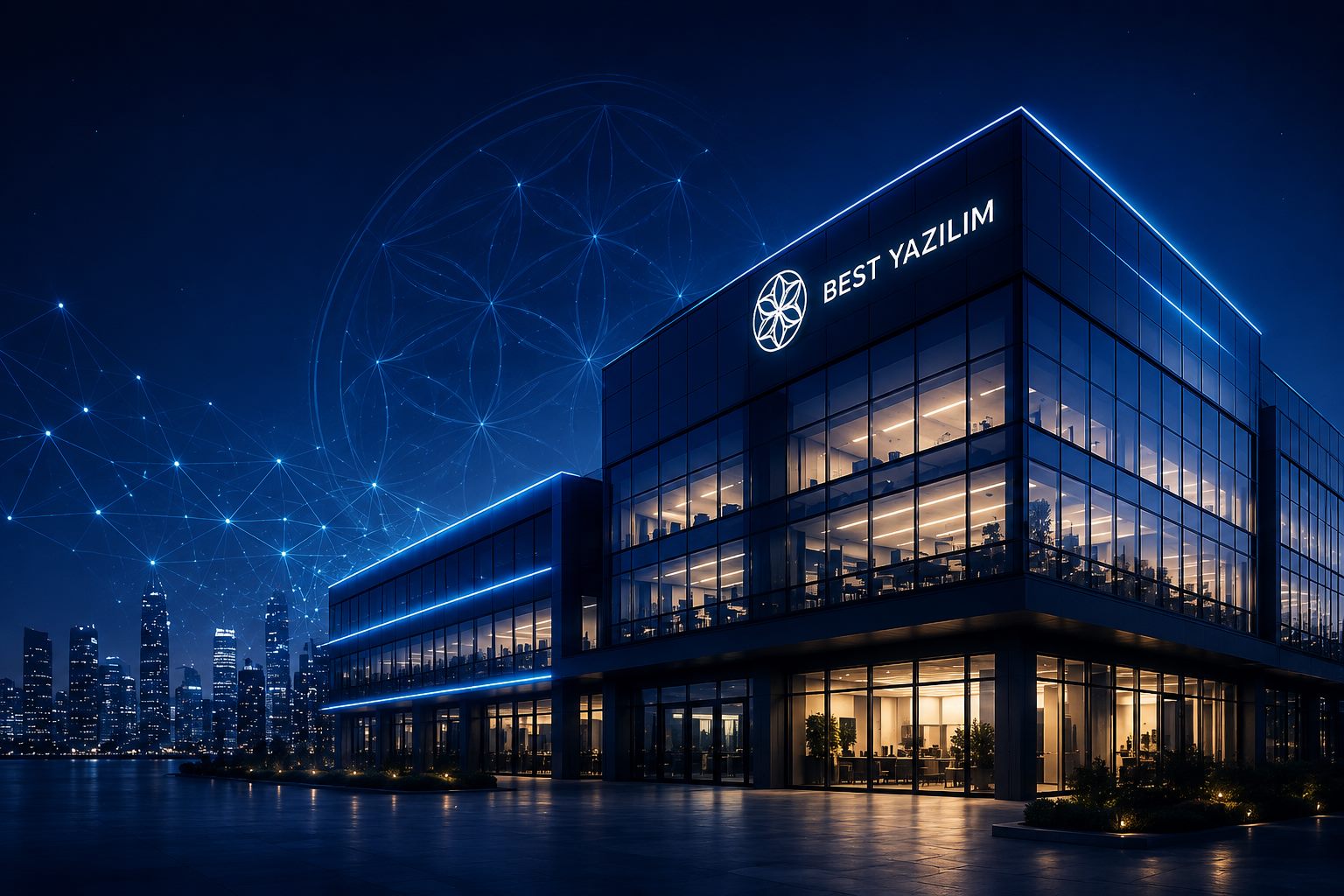 Gece mavi ışıklarla aydınlatılmış, cephesinde Best Yazılım logosu bulunan modern cam cepheli teknoloji binası